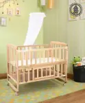 https://www.firstcry.com/babyhug/babyhug-montana-wooden-cot-cum-rocker-with-mosquito-net-natural-wheels-with-lock-storage-space-adjustable-height-openable-side-rail-foldable-headboard-attach-to-parent-bed-convert-to-study-table/3290386/product-detail